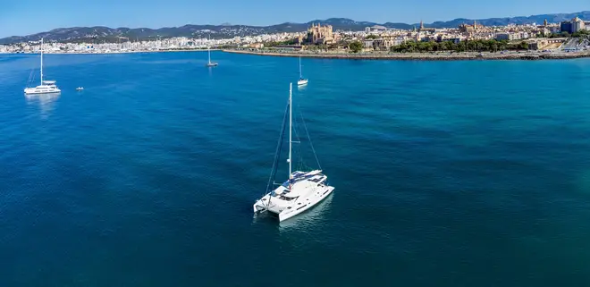 catamaran anchored in the bay of Palma, Palma, Mallorca, Balearic Islands, Spain.