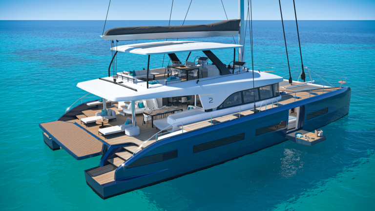 Luxury Lagoon Eighty2 catamaran with spacious flybridge, private master hull terrace, and expansive deck, sailing on clear turquoise waters.